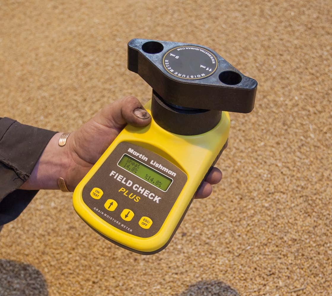 Field check plus moisture meter showing the moisture results on the screen