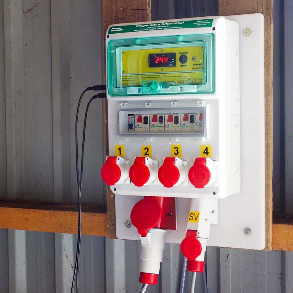 Martin Lishman Temperature Differential fan controller mounted inside a grain store